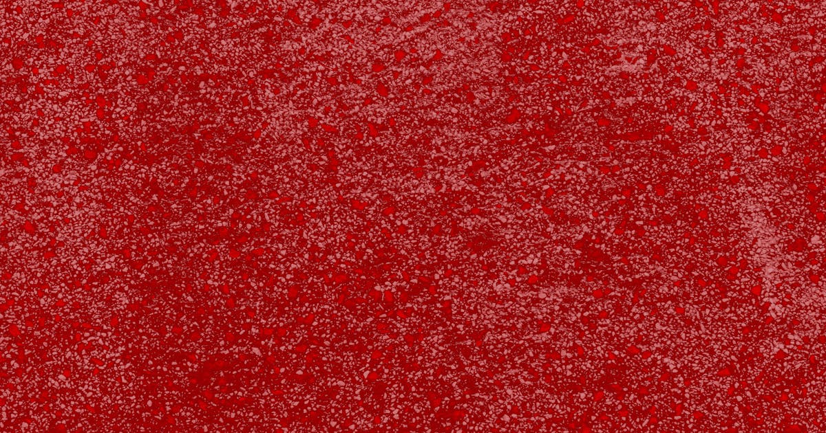 Close-up of coarse abrasive grit texture — choosing the right abrasive grain, Whitby Abrasives Ontario