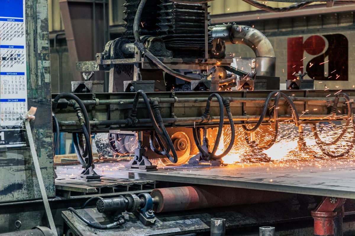 Precision machining of specialty metal in a factory — aerospace abrasives, Ontario